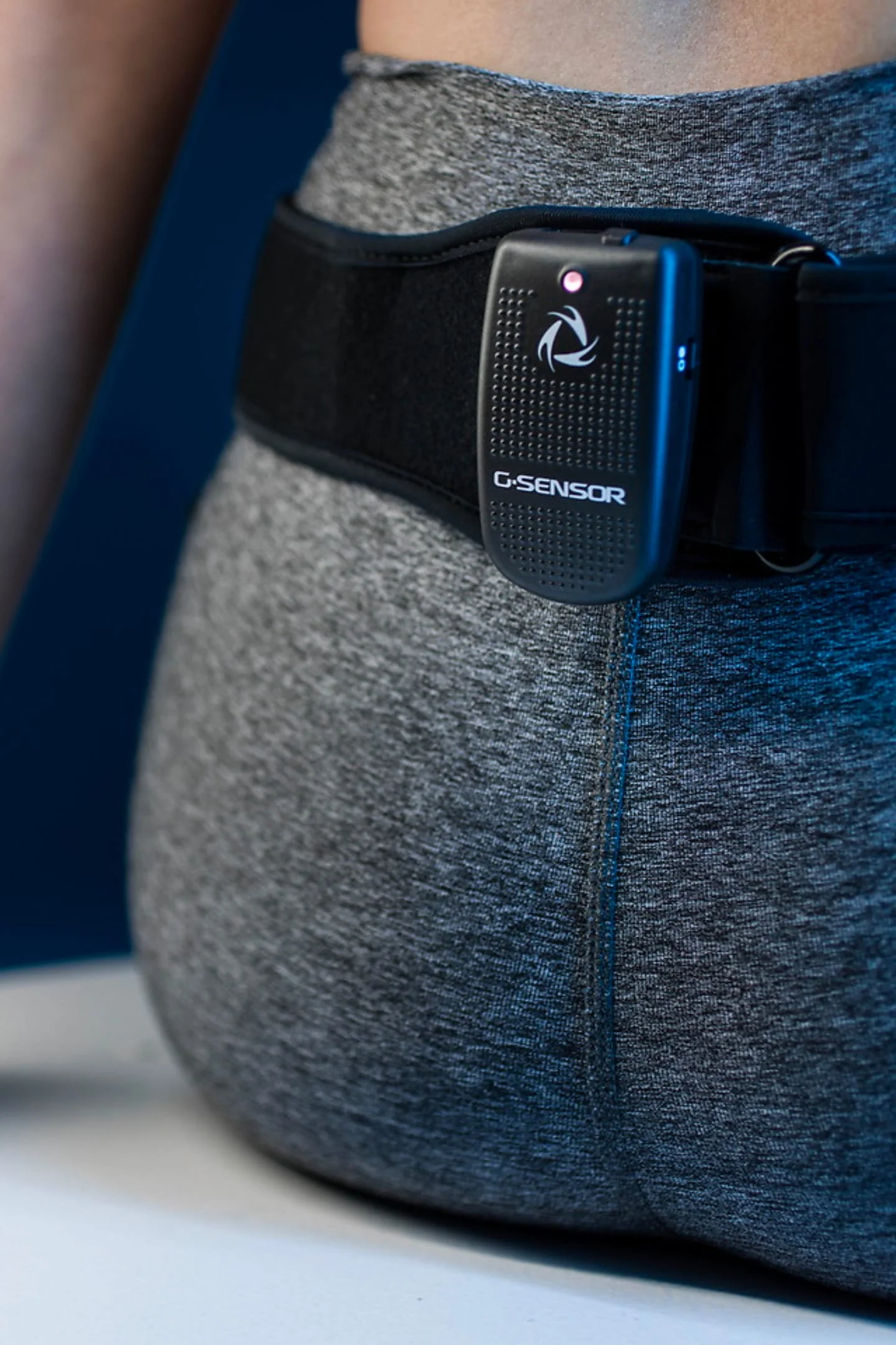 Elite athletes undergoing advanced biomechanical assessment to optimize human performance in a state-of-the-art sports laboratory